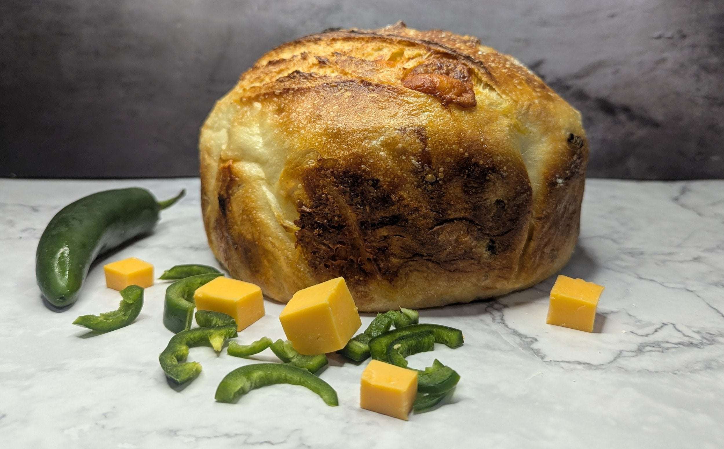 Jalapeno Cheddar Sourdough Loaf — Mystique's – Mystique's Bistro